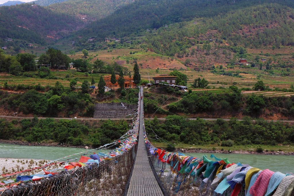 An end on view of Punakha Suspension Bridge over Pho Chu. 