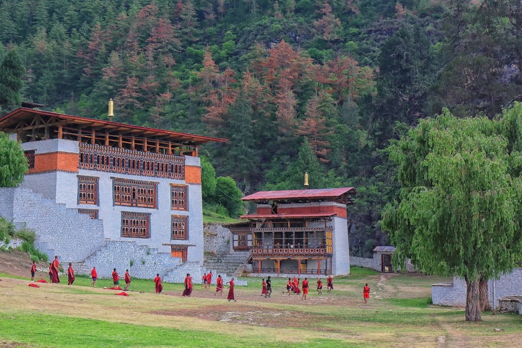 Image of young monks playing football