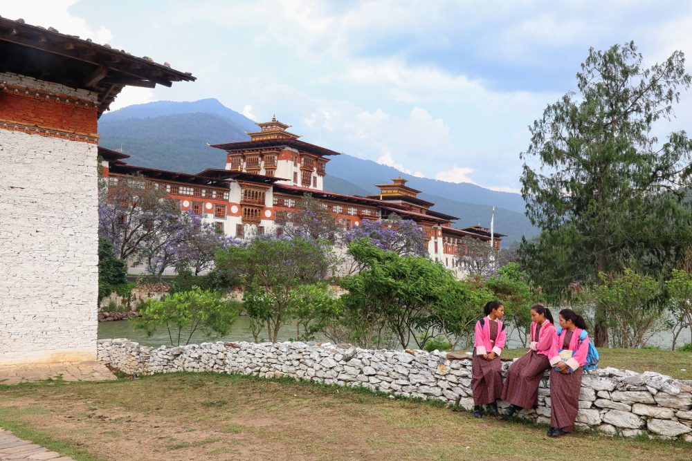 Local women outside Punakha Dzong, Bhutan.