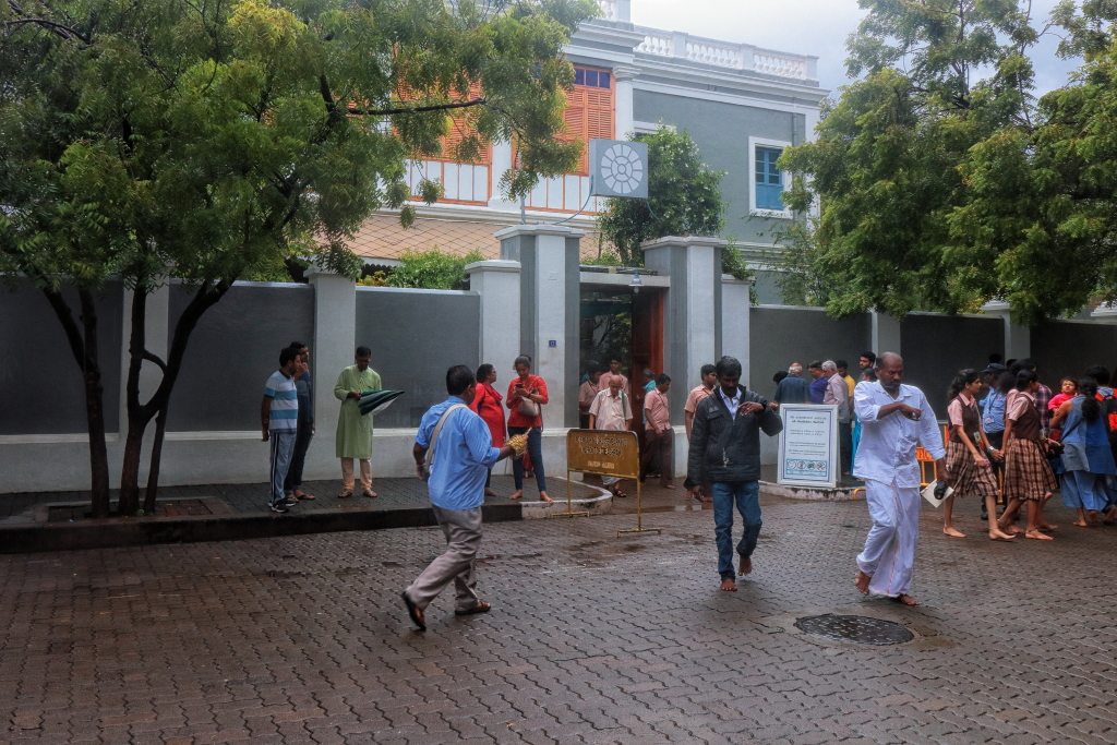 The exterior of Sri Aurobindo Ashram in Pondicherry on a rainy day