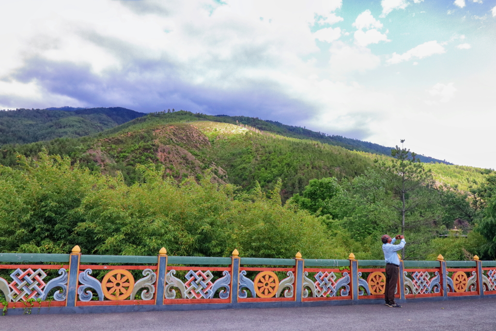 Tourist outside Thimphu Dzong