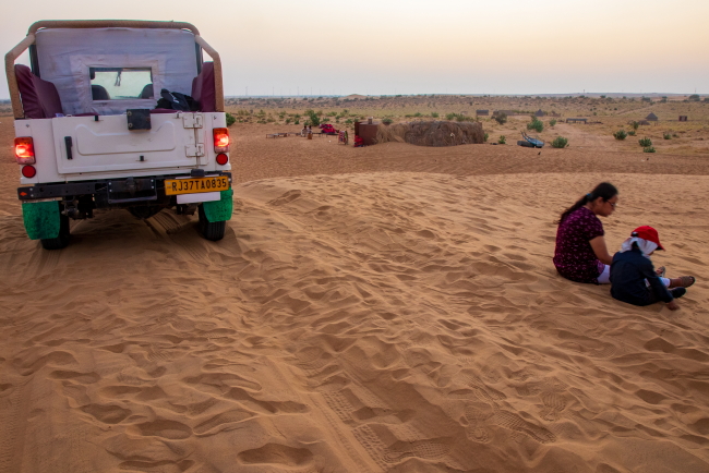 Sitting on a dune in Thar Desert in Rajasthan
