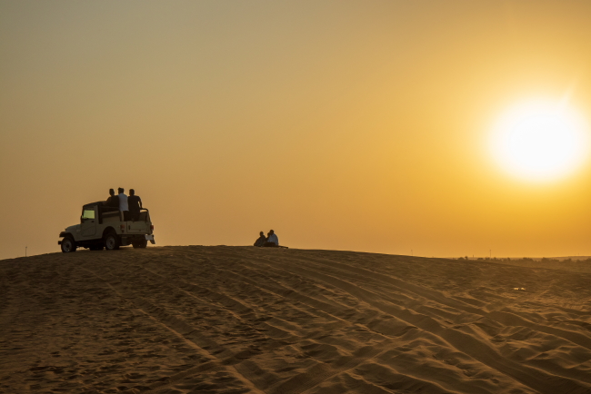 Four-wheeler driving on a sand dune in Thar Desert in Rajasthan